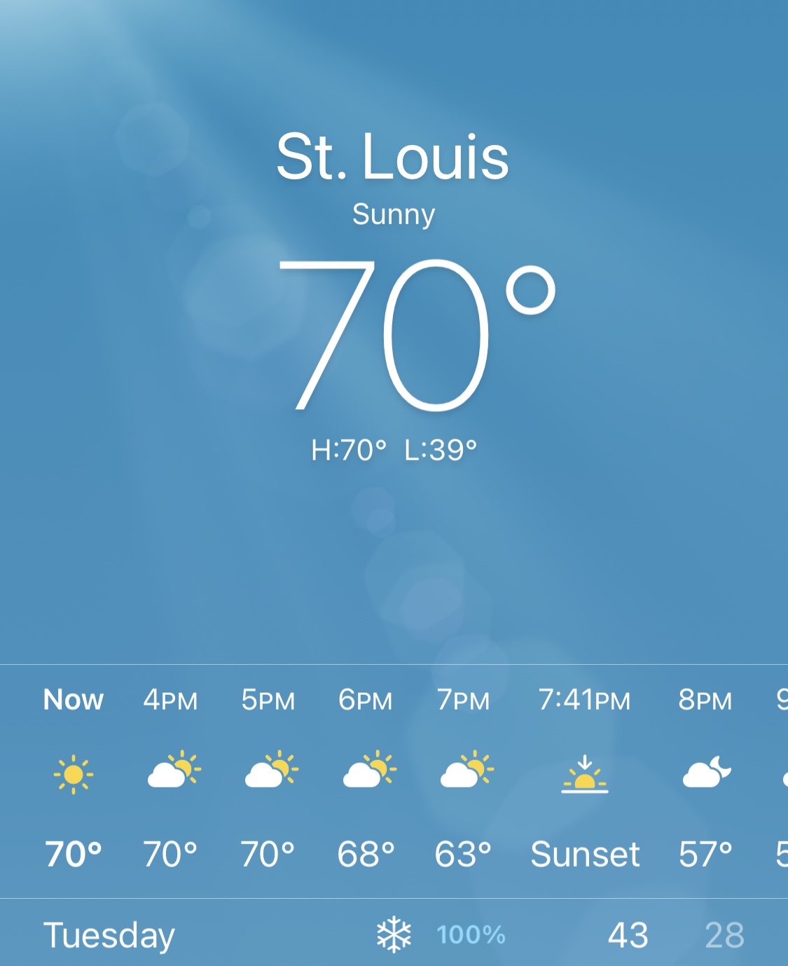 A weather forecast for St. Louis showing a current temperature of 70 degrees and a 100% chance of snow tomorrow.
