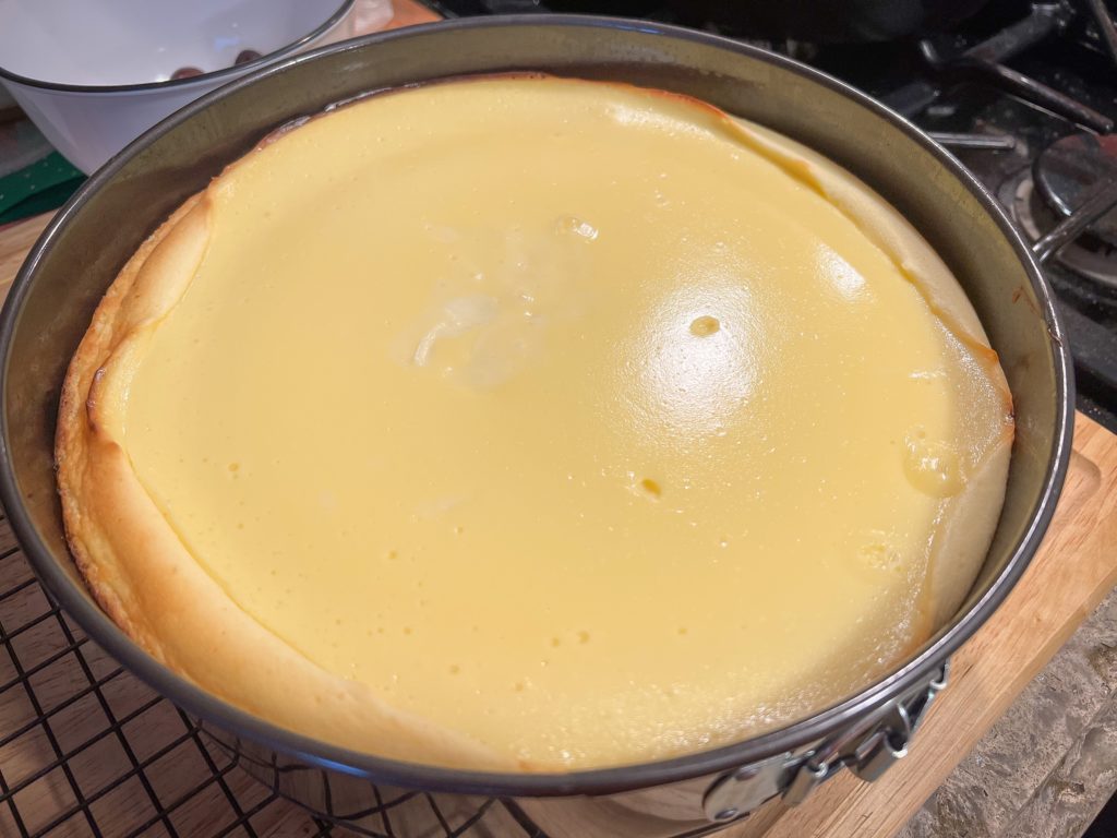 A cheesecake in a springform pan.